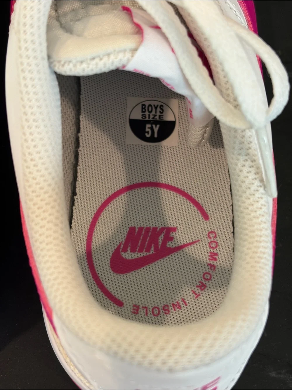 Nike White Sneakers with Pink Swoosh and Accent Stripe